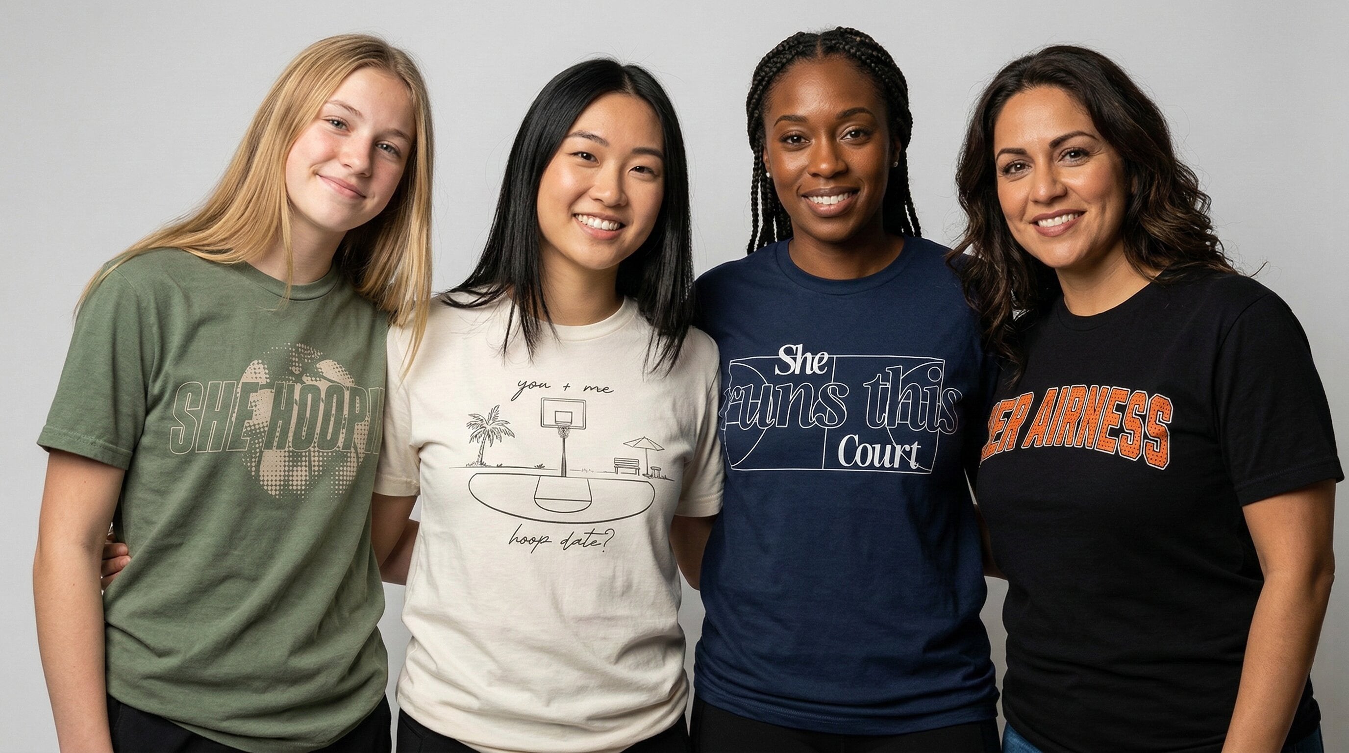 four women showing off hhc shirts
