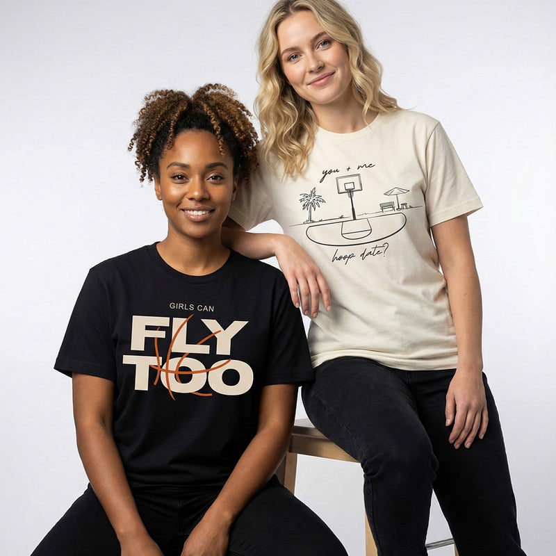 two women with shirts herhoops club designs